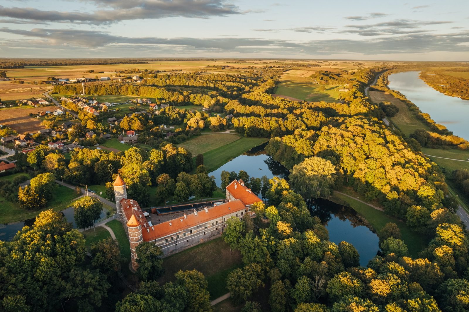 Panemunė Castle, its ponds, the surrounding village and the Nemunas River seen from above in 2025