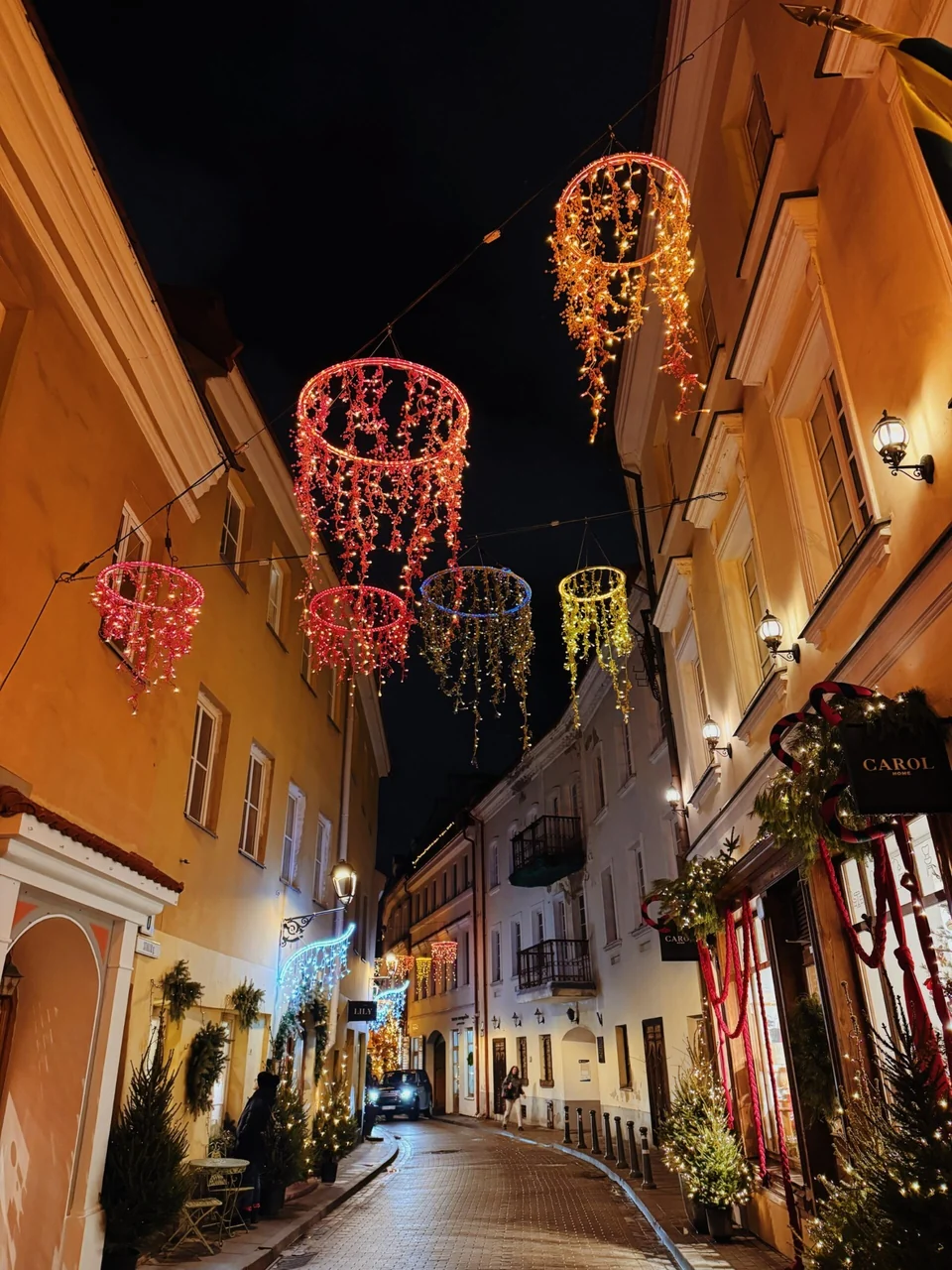 Christmas lights on a narrow Vilnius Old Town street