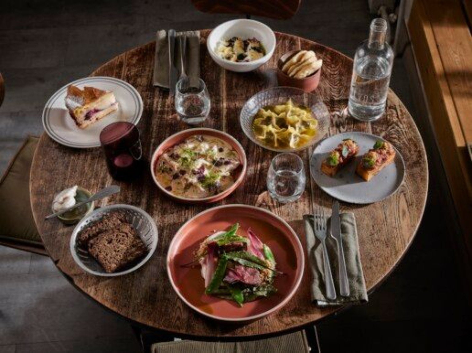 Table of dishes at Pievos in Birštonas