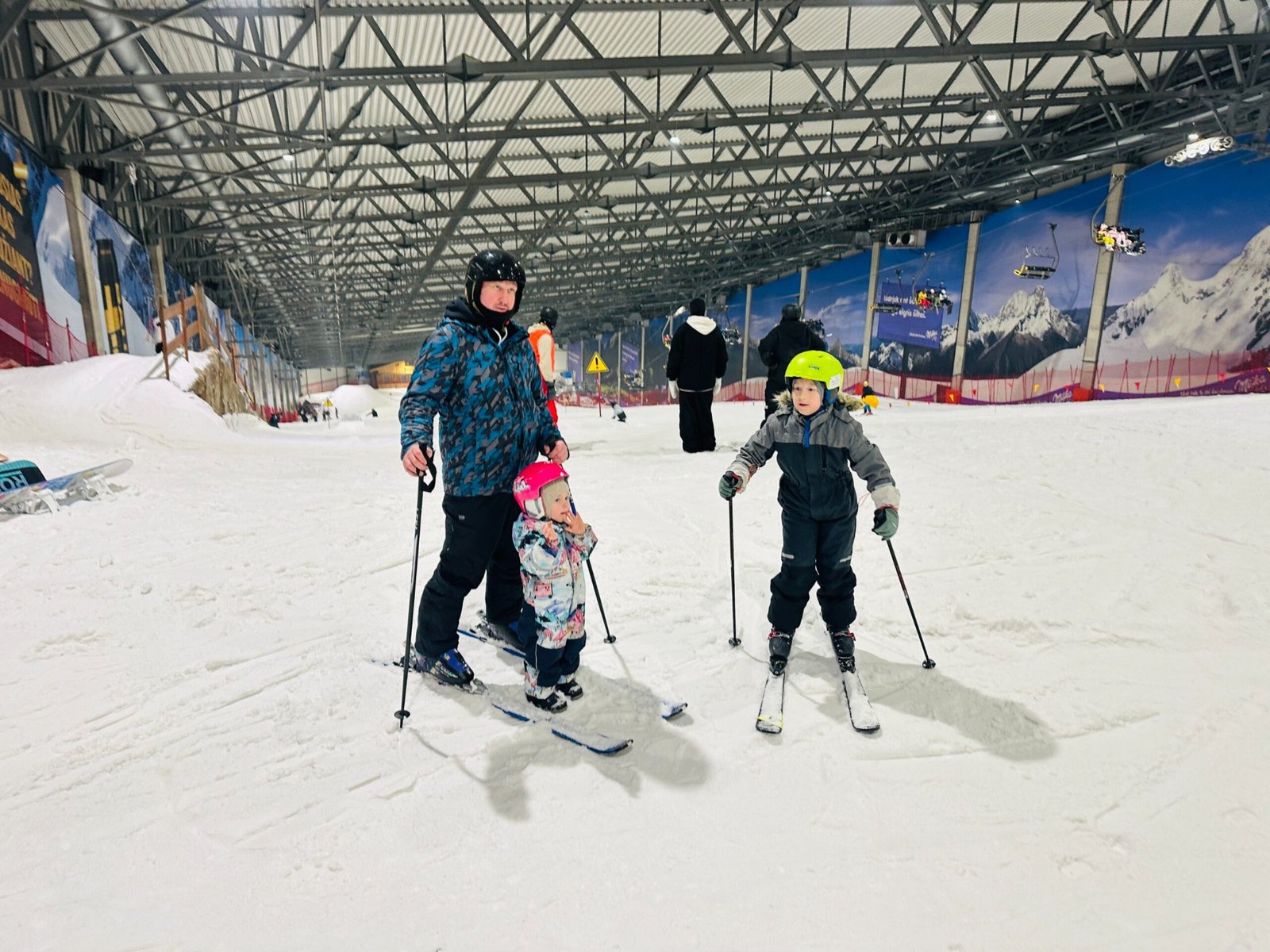 Family skiing inside Snow Arena Druskininkai